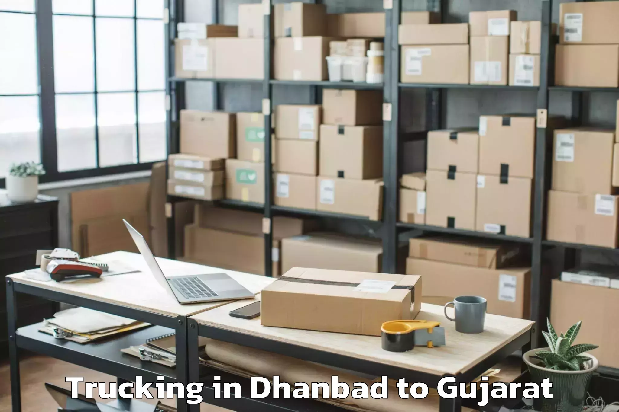 Dhanbad to Sankheda Trucking Booking